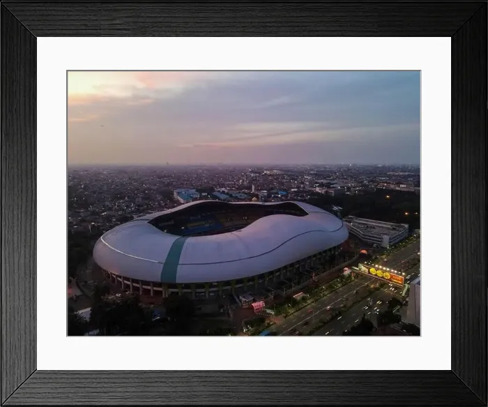 Framed Print : Aerial View of The largest stadium of Bekasi from drone when sunset and noise cloud. Bekasi, Indonesia, March 21, 2021 Framed Print : Aerial View of The largest stadium of Bekasi from drone when sunset and noise cloud. Bekasi, Indonesia, March 21, 2021