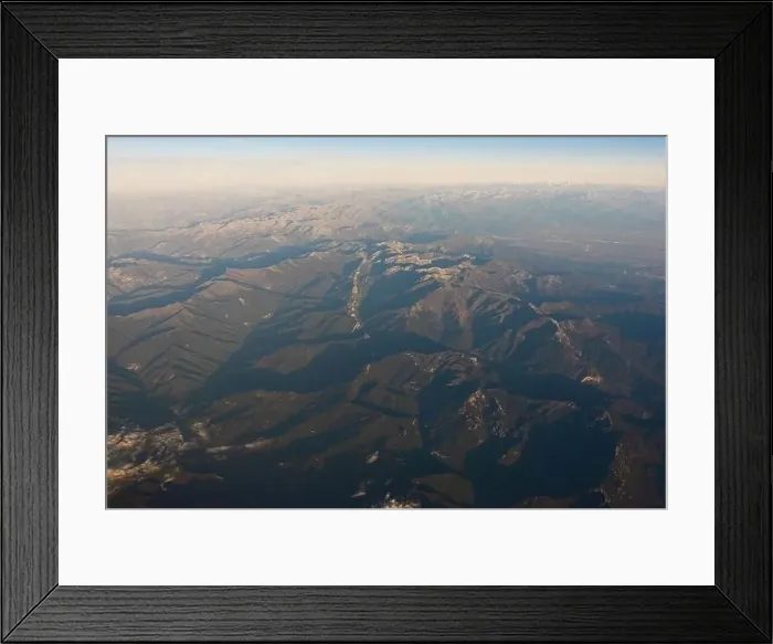 Framed Print : Aerial view of magnificent mounts with dry rough surface under cloudy sky at dawn in Dolomites Italy Framed Print : Aerial view of magnificent mounts with dry rough surface under cloudy sky at dawn in Dolomites Italy