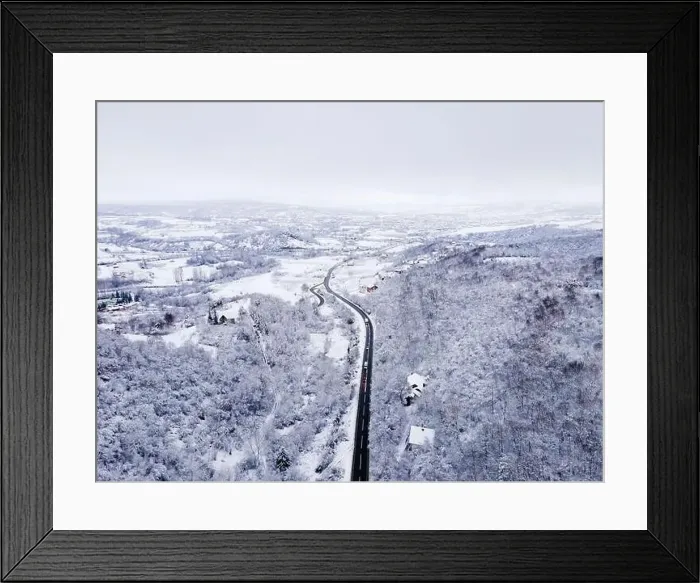 Framed Print : High angle aerial view drone image on the road trough the trees Framed Print : High angle aerial view drone image on the road trough the trees