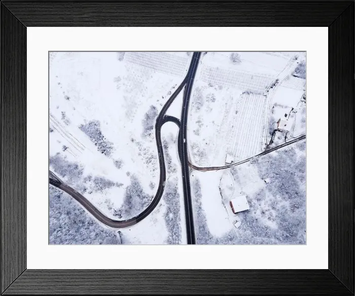 Framed Print : High angle top down aerial view drone image on road trough the trees Framed Print : High angle top down aerial view drone image on road trough the trees