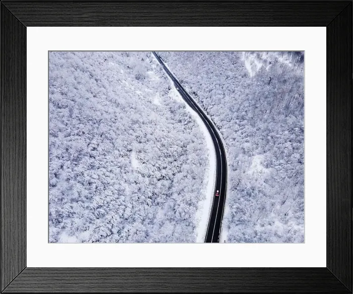 Framed Print : High angle aerial view drone image on the road trough the trees Framed Print : High angle aerial view drone image on the road trough the trees