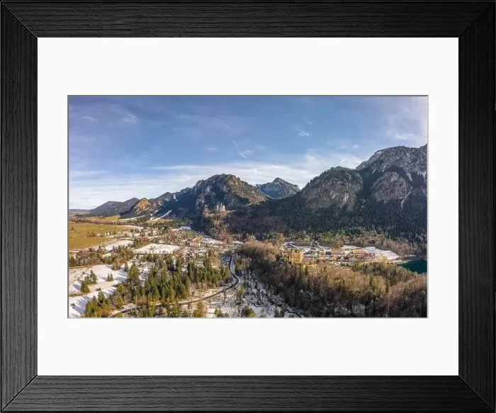 Framed Print : Aerial drone shot of Hohenschwangau in Fussen with view of Neuschwanstein castle in Germany winter Framed Print : Aerial drone shot of Hohenschwangau in Fussen with view of Neuschwanstein castle in Germany winter