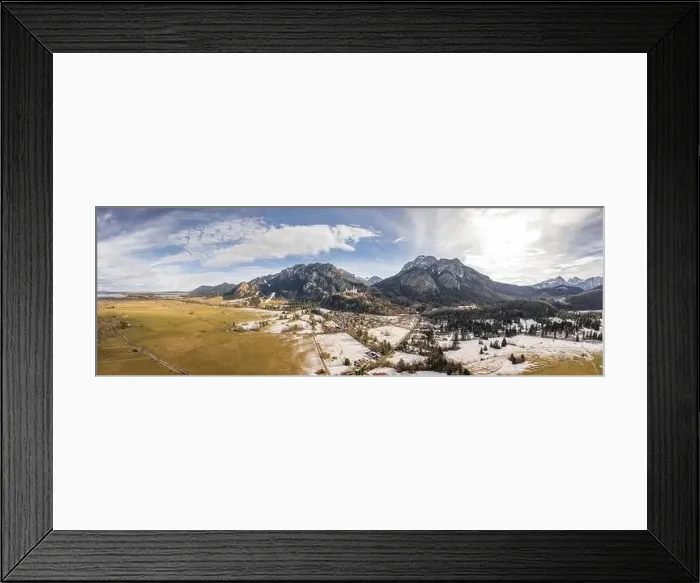 Framed Print : Aerial panorama drone shot of picturesque Neuschwanstein Castle on snowy hill in winter sunlight in Germany Framed Print : Aerial panorama drone shot of picturesque Neuschwanstein Castle on snowy hill in winter sunlight in Germany