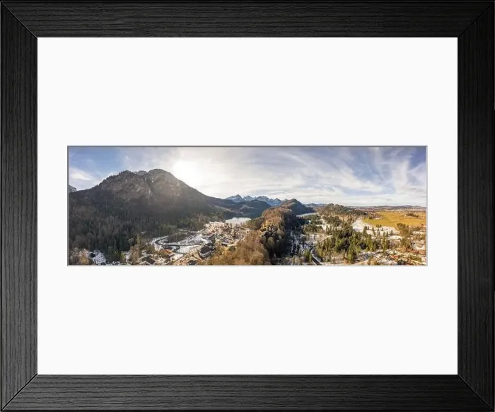 Framed Print : Aerial panorama drone shot of Hohenschwangau by lake in Fussen with view of Alps snow mountain range in Germany winter Framed Print : Aerial panorama drone shot of Hohenschwangau by lake in Fussen with view of Alps snow mountain range in Germany winter