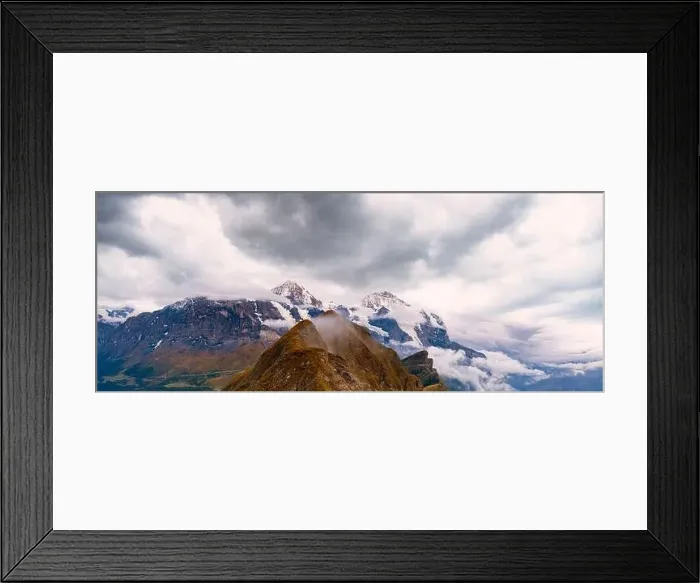 Framed Print : Clouds over Eiger, Monch and Jungfrau mountains view from Mannlichen Framed Print : Clouds over Eiger, Monch and Jungfrau mountains view from Mannlichen
