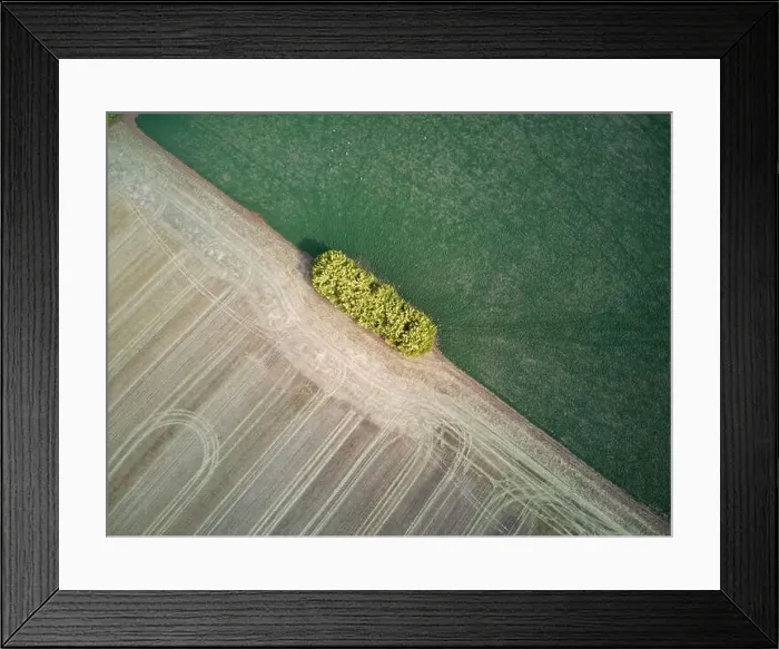 Framed Print : Farmland aerial view different fields showing agricultural crop patterns and tracks with a green and brown background Framed Print : Farmland aerial view different fields showing agricultural crop patterns and tracks with a green and brown background