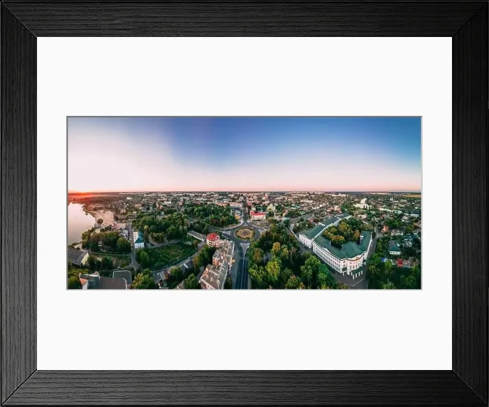 Framed Print : Aerial panoramic view of roundabout road with circular cars in small european city at cloudy autumn day Framed Print : Aerial panoramic view of roundabout road with circular cars in small european city at cloudy autumn day