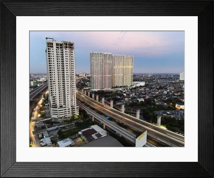 Framed Print : Aerial view of highway intersection and buildings in the city of Bekasi and noise cloud with Bekasi cityscape Framed Print : Aerial view of highway intersection and buildings in the city of Bekasi and noise cloud with Bekasi cityscape