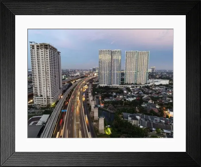 Framed Print : Aerial view of highway intersection and buildings in the city of Bekasi and noise cloud with Bekasi cityscape Framed Print : Aerial view of highway intersection and buildings in the city of Bekasi and noise cloud with Bekasi cityscape