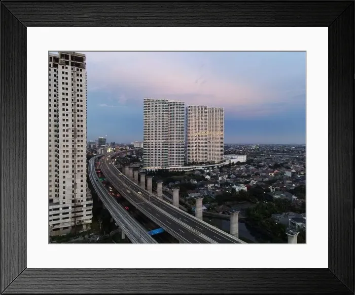 Framed Print : Aerial view of highway intersection and buildings in the city of Bekasi and noise cloud with Bekasi cityscape Framed Print : Aerial view of highway intersection and buildings in the city of Bekasi and noise cloud with Bekasi cityscape