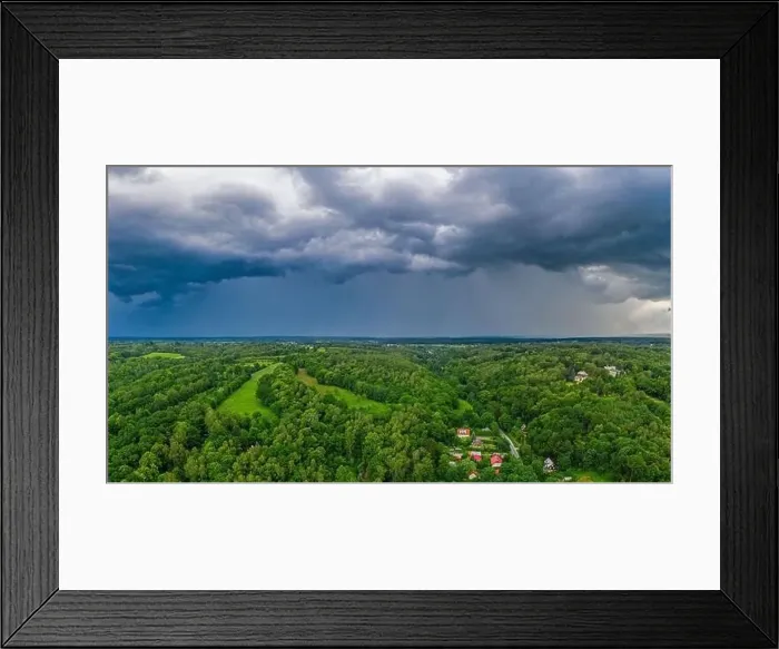 Framed Print : Aerial view of dark cloudy sky over forest minute before rain Framed Print : Aerial view of dark cloudy sky over forest minute before rain