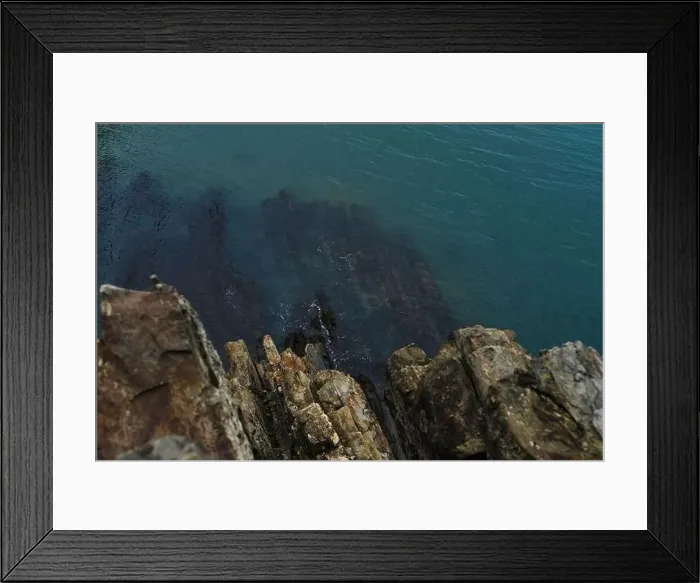 Framed Print : View from a high cliff to the blue turquoise clear sea and coral reefs under the water