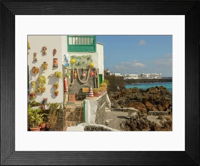 Framed Print : Punta Mujeres, Spain - 18 January 2021: the village of Punta Mujeres on Lanzarote island in Spain Framed Print : Punta Mujeres, Spain - 18 January 2021: the village of Punta Mujeres on Lanzarote island in Spain