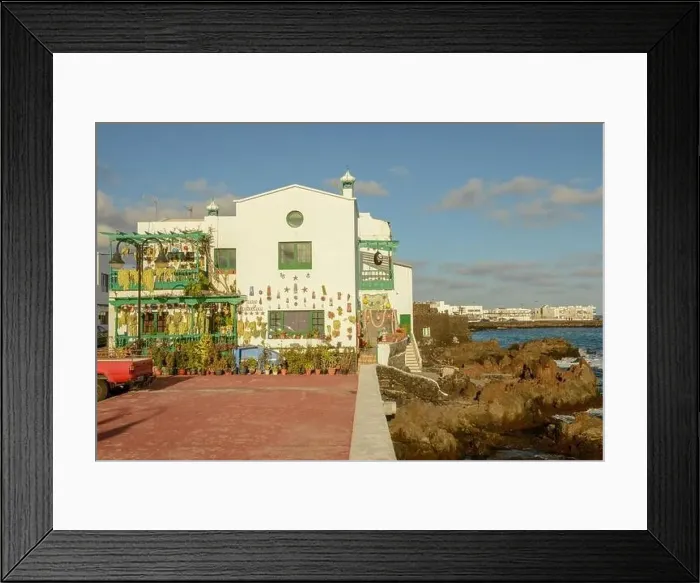 Framed Print : Punta Mujeres, Spain - 18 January 2021: the village of Punta Mujeres on Lanzarote island in Spain Framed Print : Punta Mujeres, Spain - 18 January 2021: the village of Punta Mujeres on Lanzarote island in Spain