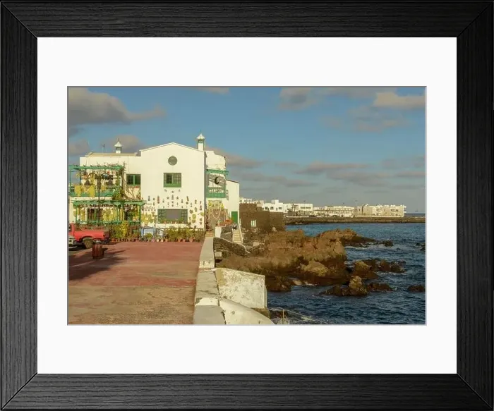 Framed Print : Punta Mujeres, Spain - 18 January 2021: the village of Punta Mujeres on Lanzarote island in Spain Framed Print : Punta Mujeres, Spain - 18 January 2021: the village of Punta Mujeres on Lanzarote island in Spain