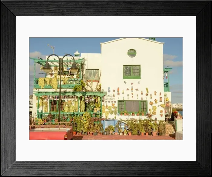 Framed Print : Punta Mujeres, Spain - 18 January 2021: rustical house at the village of Punta Mujeres on Lanzarote island in Spain Framed Print : Punta Mujeres, Spain - 18 January 2021: rustical house at the village of Punta Mujeres on Lanzarote island in Spain