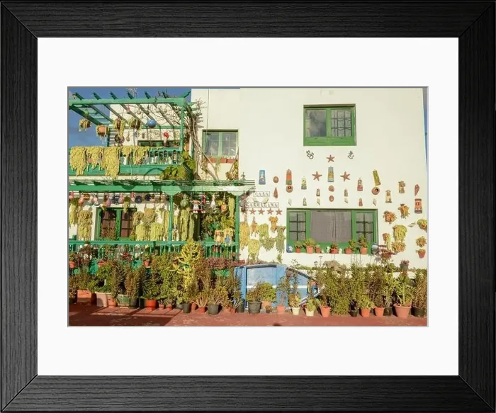 Framed Print : Punta Mujeres, Spain - 18 January 2021: rustical house at the village of Punta Mujeres on Lanzarote island in Spain Framed Print : Punta Mujeres, Spain - 18 January 2021: rustical house at the village of Punta Mujeres on Lanzarote island in Spain