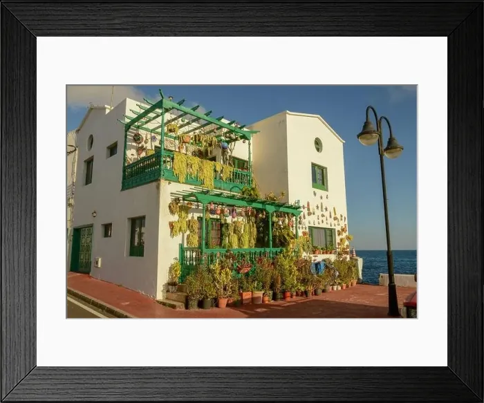 Framed Print : Punta Mujeres, Spain - 18 January 2021: rustical house at the village of Punta Mujeres on Lanzarote island in Spain Framed Print : Punta Mujeres, Spain - 18 January 2021: rustical house at the village of Punta Mujeres on Lanzarote island in Spain