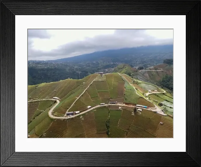 Framed Print : Aerial view of World heritage Panyaweuyan rice terraces in Majalengka with noise cloud Framed Print : Aerial view of World heritage Panyaweuyan rice terraces in Majalengka with noise cloud