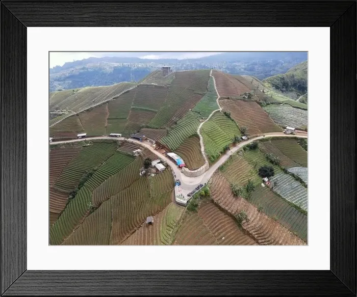 Framed Print : Aerial view of World heritage Panyaweuyan rice terraces in Majalengka with noise cloud Framed Print : Aerial view of World heritage Panyaweuyan rice terraces in Majalengka with noise cloud