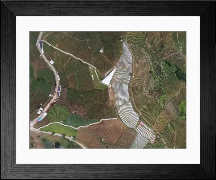 Framed Print : Aerial view of World heritage Panyaweuyan rice terraces in Majalengka with noise cloud Framed Print : Aerial view of World heritage Panyaweuyan rice terraces in Majalengka with noise cloud