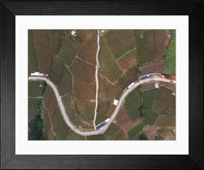 Framed Print : Aerial view of World heritage Panyaweuyan rice terraces in Majalengka with noise cloud Framed Print : Aerial view of World heritage Panyaweuyan rice terraces in Majalengka with noise cloud
