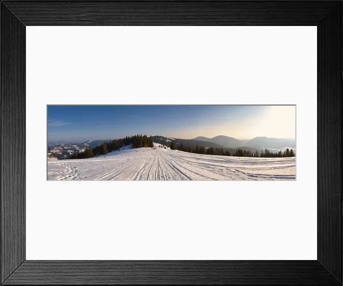 Framed Print : View of the stunning winter panorama of the snowy slopes and hills among the lush white clouds Framed Print : View of the stunning winter panorama of the snowy slopes and hills among the lush white clouds