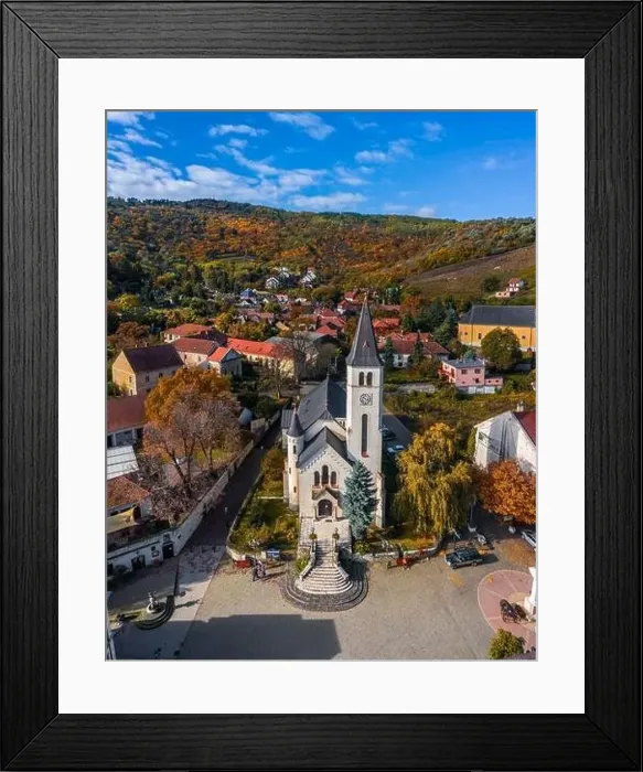 Framed Print : Tokaj, Hungary - Aerial view of the Heart of Jesus Church at the main square of the town of Tokaj on a sunny autumn Framed Print : Tokaj, Hungary - Aerial view of the Heart of Jesus Church at the main square of the town of Tokaj on a sunny autumn
