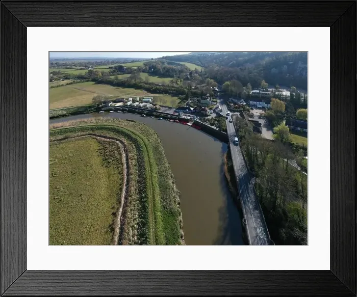Framed Print : Aerial Photo of Amberley on the banks of the River Arun in West Sussex in a scenic position within the South Downs Framed Print : Aerial Photo of Amberley on the banks of the River Arun in West Sussex in a scenic position within the South Downs