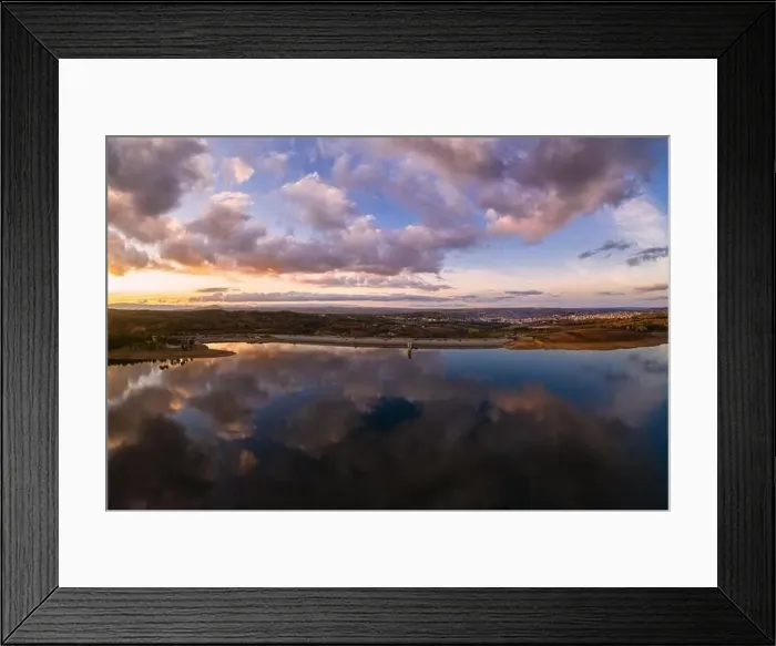 Framed Print : Drone aerial view of a lake reservoir of a dam with perfect reflection on the water of the sunset in Sabugal, Portugal Framed Print : Drone aerial view of a lake reservoir of a dam with perfect reflection on the water of the sunset in Sabugal, Portugal