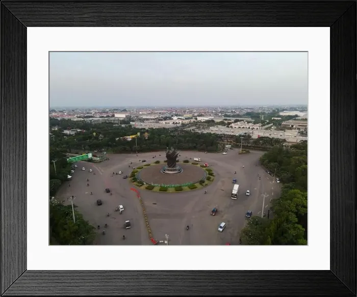 Framed Print : Aerial top down of traffic in Bekasi roundabout during sunny day. Cars passing road. Bekasi. Indonesia. May, 6 2021 Framed Print : Aerial top down of traffic in Bekasi roundabout during sunny day. Cars passing road. Bekasi. Indonesia. May, 6 2021