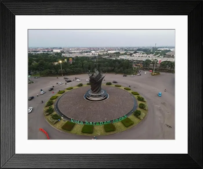 Framed Print : Aerial top down of traffic in Bekasi roundabout during sunny day. Cars passing road. Bekasi. Indonesia. May, 6 2021 Framed Print : Aerial top down of traffic in Bekasi roundabout during sunny day. Cars passing road. Bekasi. Indonesia. May, 6 2021