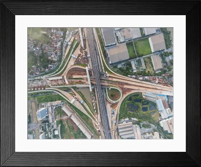 Framed Print : Aerial view on the new road construction site at Bekasi. Bekasi, Indonesia, April 26, 2021 Framed Print : Aerial view on the new road construction site at Bekasi. Bekasi, Indonesia, April 26, 2021
