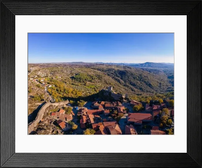 Framed Print : Drone aerial panorama of historic village of Sortelha with castle and with turbines on natural landscape, in Portugal Framed Print : Drone aerial panorama of historic village of Sortelha with castle and with turbines on natural landscape, in Portugal