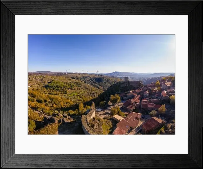 Framed Print : Drone aerial panorama of historic village of Sortelha with castle and with turbines on natural landscape, in Portugal Framed Print : Drone aerial panorama of historic village of Sortelha with castle and with turbines on natural landscape, in Portugal