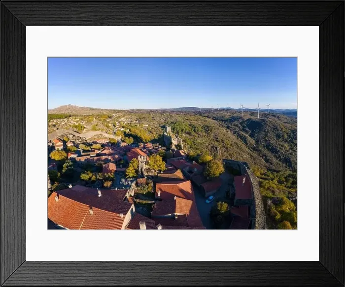 Framed Print : Drone aerial panorama of historic village of Sortelha with castle and with turbines on natural landscape, in Portugal Framed Print : Drone aerial panorama of historic village of Sortelha with castle and with turbines on natural landscape, in Portugal