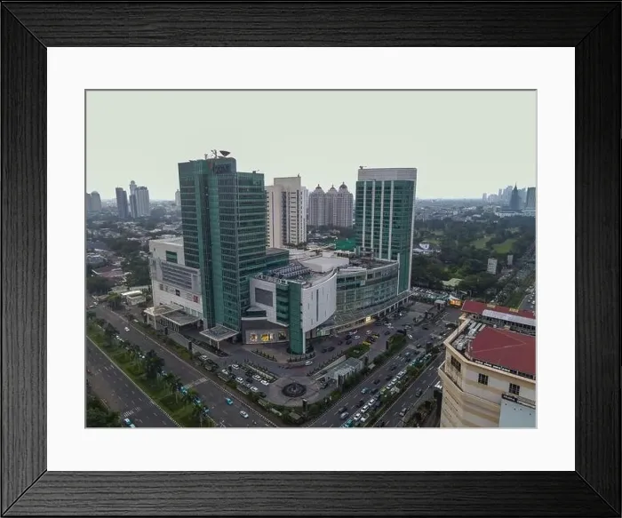 Framed Print : Aerial view of buildings in the city of Jakarta and noise cloud with Jakarta cityscape. Jakarta, Indonesia, May 6, 2021 Framed Print : Aerial view of buildings in the city of Jakarta and noise cloud with Jakarta cityscape. Jakarta, Indonesia, May 6, 2021