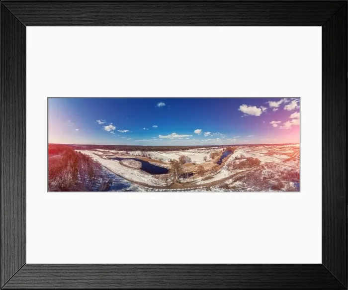 Framed Print : View from above of the countryside and brook on a winter sunny day Framed Print : View from above of the countryside and brook on a winter sunny day