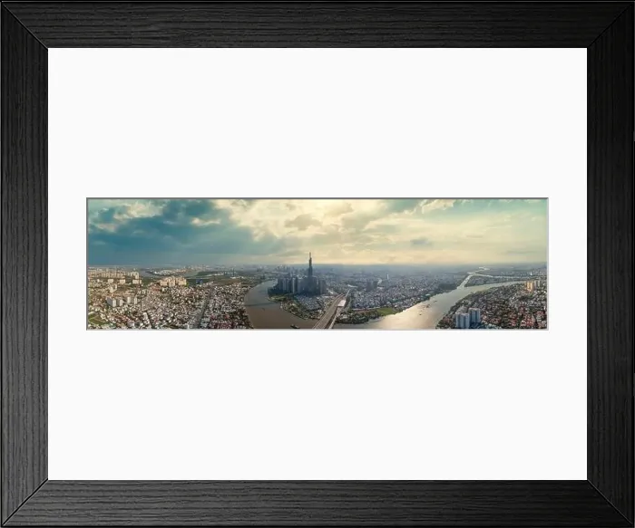 Framed Print : Drone view photo of Ho Chi Minh city skyline with dramatic sky Framed Print : Drone view photo of Ho Chi Minh city skyline with dramatic sky