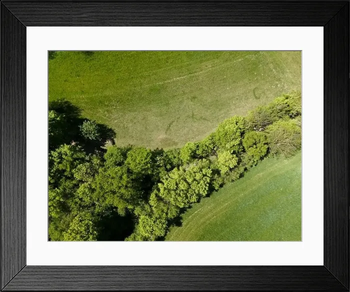 Framed Print : aerial drone flight photo of green hills, meadows and fresh forest in Lower Austria at the edge of Vienna Woods Framed Print : aerial drone flight photo of green hills, meadows and fresh forest in Lower Austria at the edge of Vienna Woods