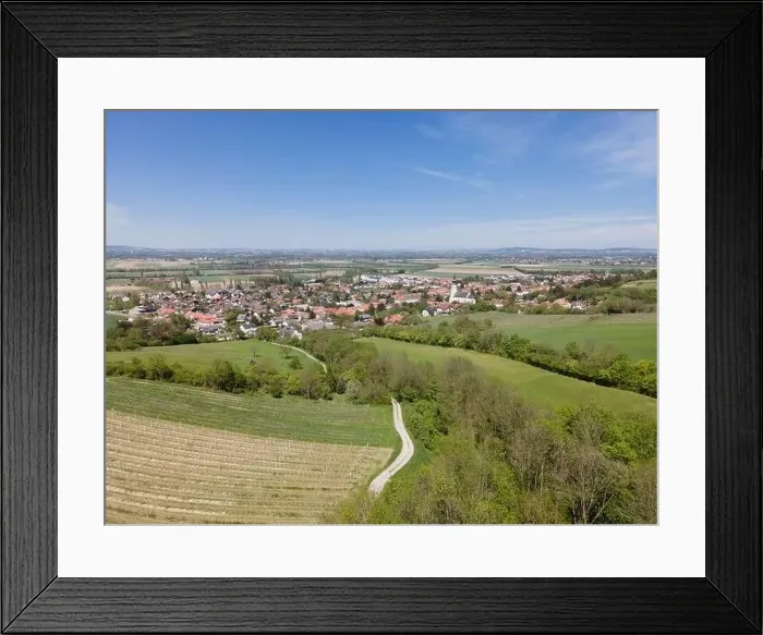 Framed Print : aerial drone flight photo of green hills, meadows and fresh forest in Lower Austria at the edge of Vienna Woods Framed Print : aerial drone flight photo of green hills, meadows and fresh forest in Lower Austria at the edge of Vienna Woods