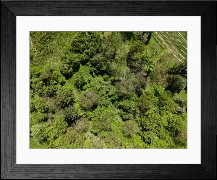Framed Print : aerial drone flight photo of green hills, meadows and fresh forest in Lower Austria at the edge of Vienna Woods Framed Print : aerial drone flight photo of green hills, meadows and fresh forest in Lower Austria at the edge of Vienna Woods