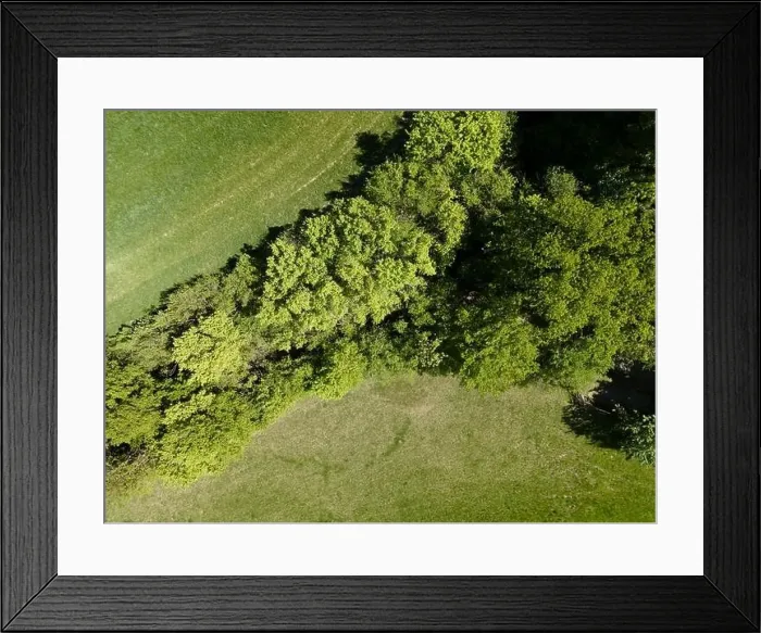 Framed Print : aerial drone flight photo of green hills, meadows and fresh forest in Lower Austria at the edge of Vienna Woods Framed Print : aerial drone flight photo of green hills, meadows and fresh forest in Lower Austria at the edge of Vienna Woods