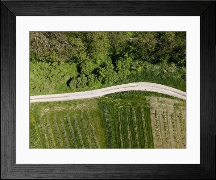 Framed Print : aerial drone flight photo of green hills, meadows and fresh forest in Lower Austria at the edge of Vienna Woods Framed Print : aerial drone flight photo of green hills, meadows and fresh forest in Lower Austria at the edge of Vienna Woods