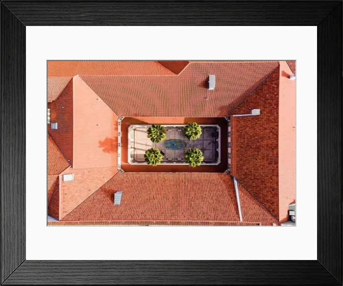 Framed Print : Aerial view of a beautiful courtyard with porch and palm trees in a catholic school and convent in Lisbon, Portugal Framed Print : Aerial view of a beautiful courtyard with porch and palm trees in a catholic school and convent in Lisbon, Portugal