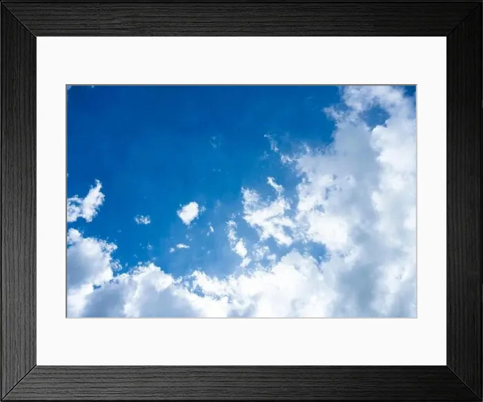 Framed Print : Stunning view of a blue sky with some fluffy clouds. Aerial shoot, natural background with copy space Framed Print : Stunning view of a blue sky with some fluffy clouds. Aerial shoot, natural background with copy space