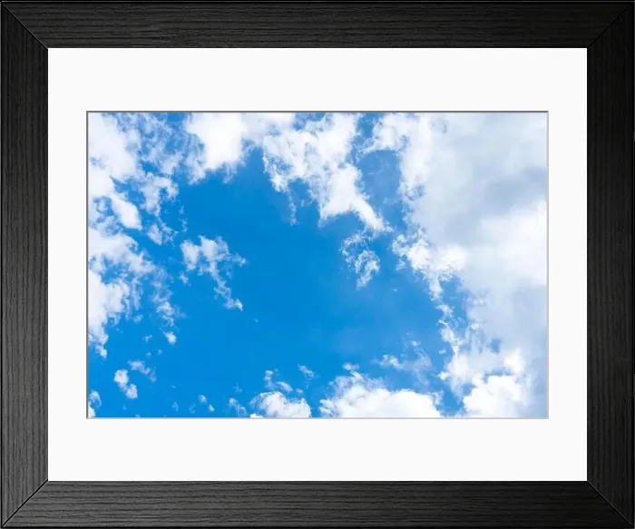 Framed Print : Stunning view of a blue sky with some fluffy clouds. Aerial shoot, natural background with copy space Framed Print : Stunning view of a blue sky with some fluffy clouds. Aerial shoot, natural background with copy space