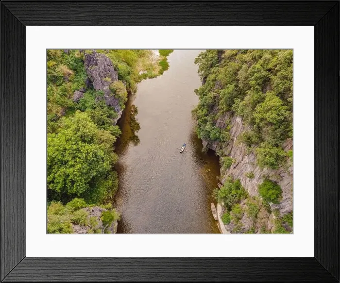 Framed Print : the majestic scenery on Ngo Dong river in Tam Coc Bich Dong view from drone in Ninh Binh province of Viet Nam Framed Print : the majestic scenery on Ngo Dong river in Tam Coc Bich Dong view from drone in Ninh Binh province of Viet Nam