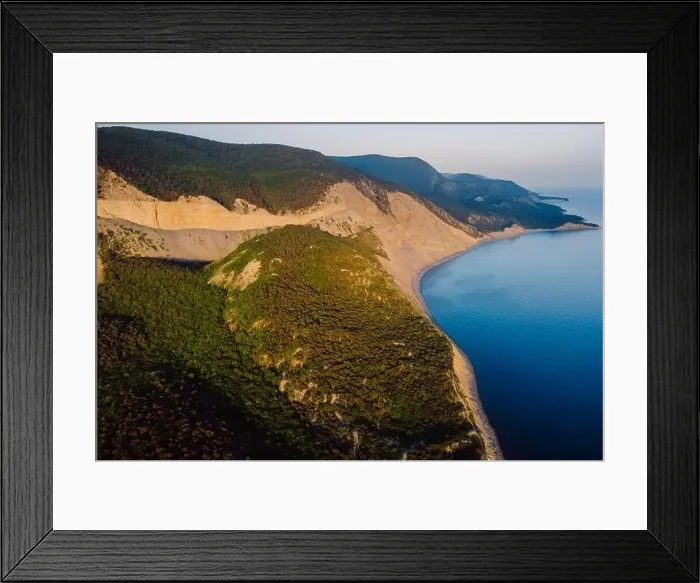 Framed Print : Aerial view of coastline with sea, mountains, canyon and cliffs with sunset light Framed Print : Aerial view of coastline with sea, mountains, canyon and cliffs with sunset light