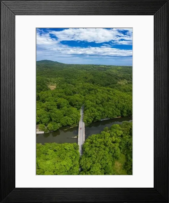 Framed Print : Aerial view to a bridge over the river in the mountain Framed Print : Aerial view to a bridge over the river in the mountain